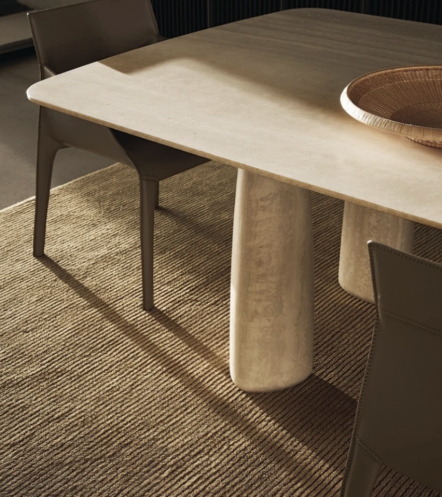 Monolith travertin dining table